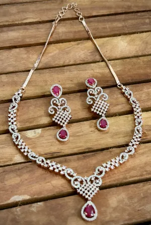 7. Pink American Diamond necklace with pink stones and rose gold polish