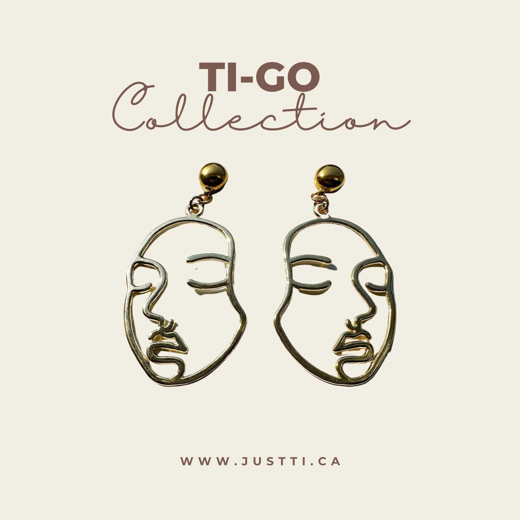 Ti-Go Golden face earrings